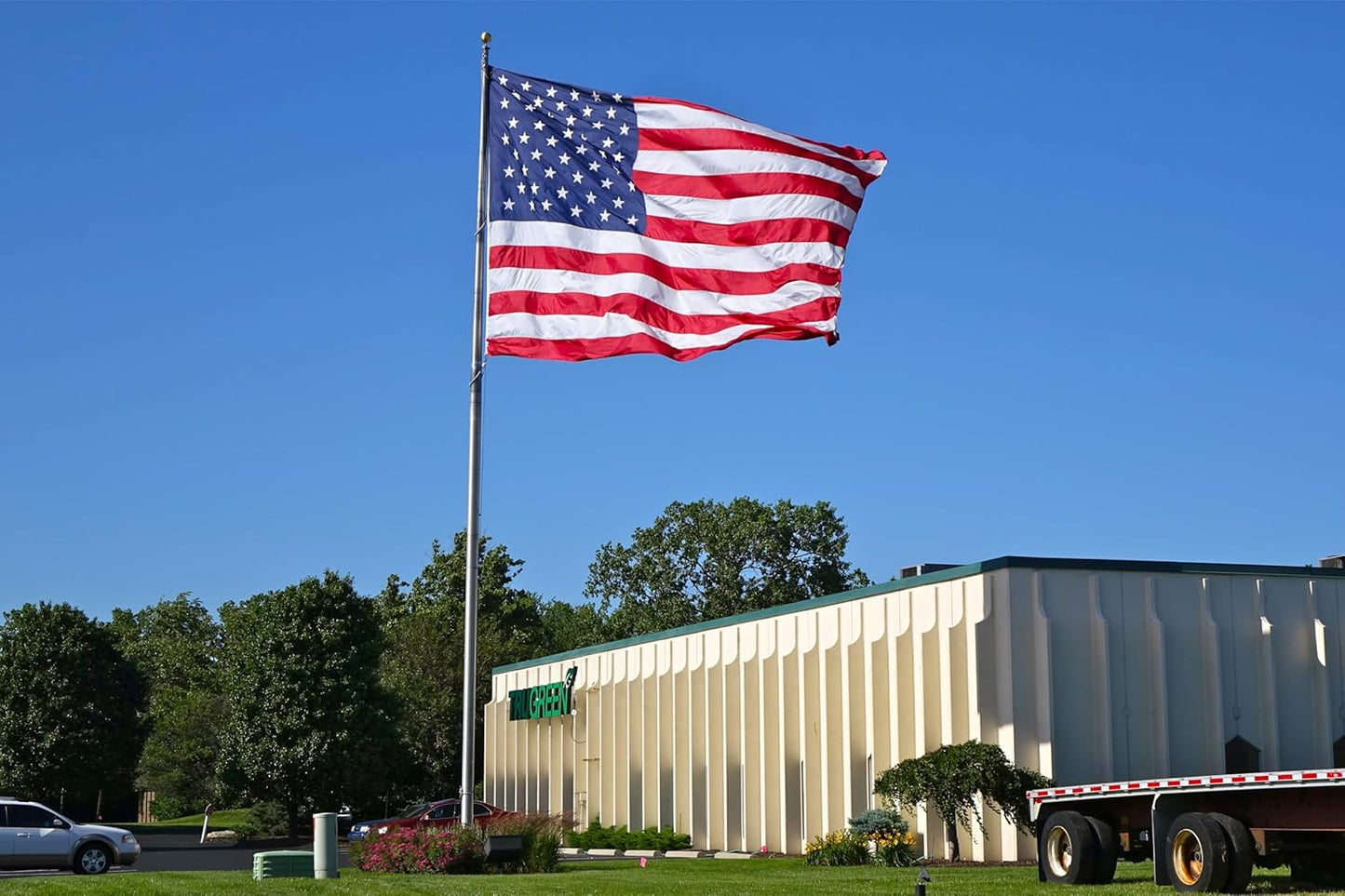 American Flag 6x10 Ft Made in USA TearProof Series for Outside, Heavy Duty Tough Spun Polyester All Weather US Flag for High Wind, Embroidered Stars Sewn Stripes and Brass Grommets